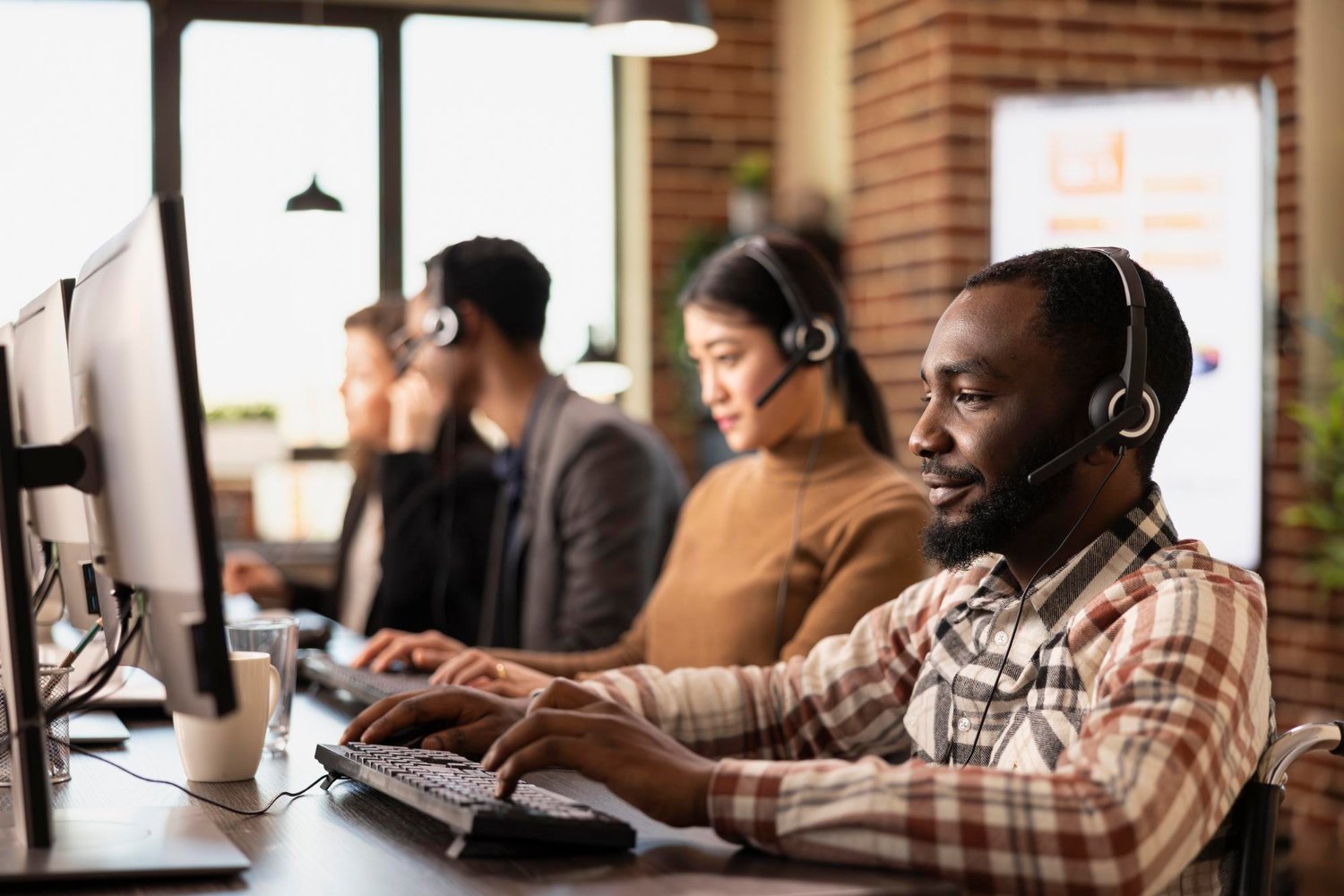 Diverse CallTawk team working together at the call center